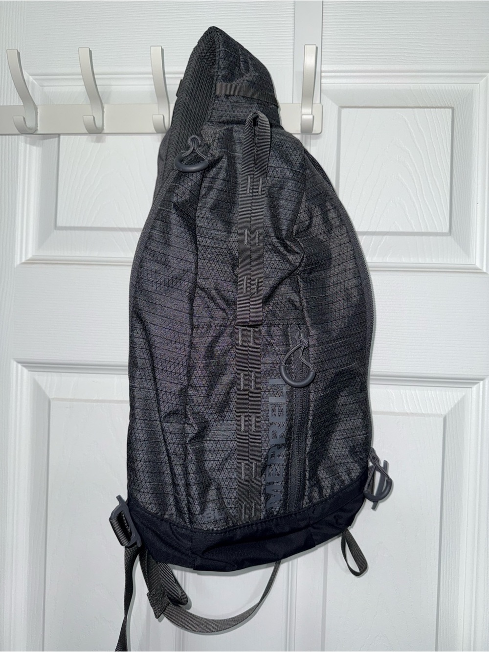 Merrell Black Women's Sling Pack with Reflective Accents